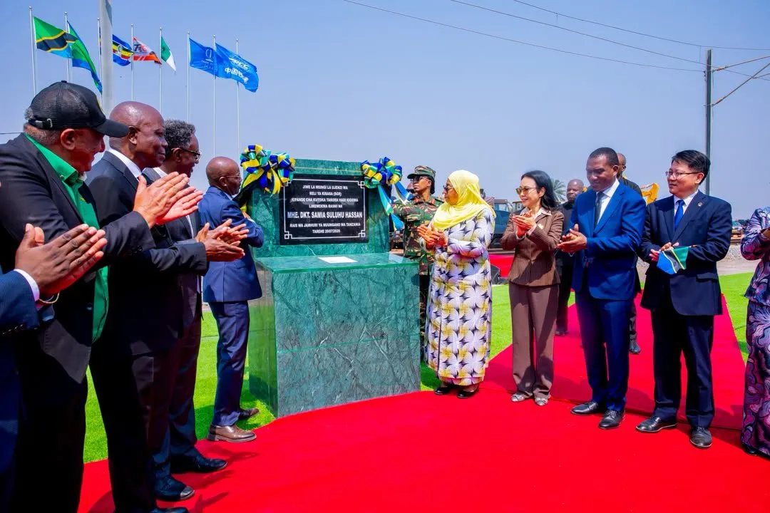 The President of the United Republic of Tanzania, Her Excellency Dr. Samia Suluhu Hassan, cutting the ceremonial ribbon to mark the laying of the foundation stone for the construction of the Standard Gauge Railway (SGR) Section Six from Tabora to Kigoma, during an event held at Katosho in Kigoma Region on 20 July 2026.