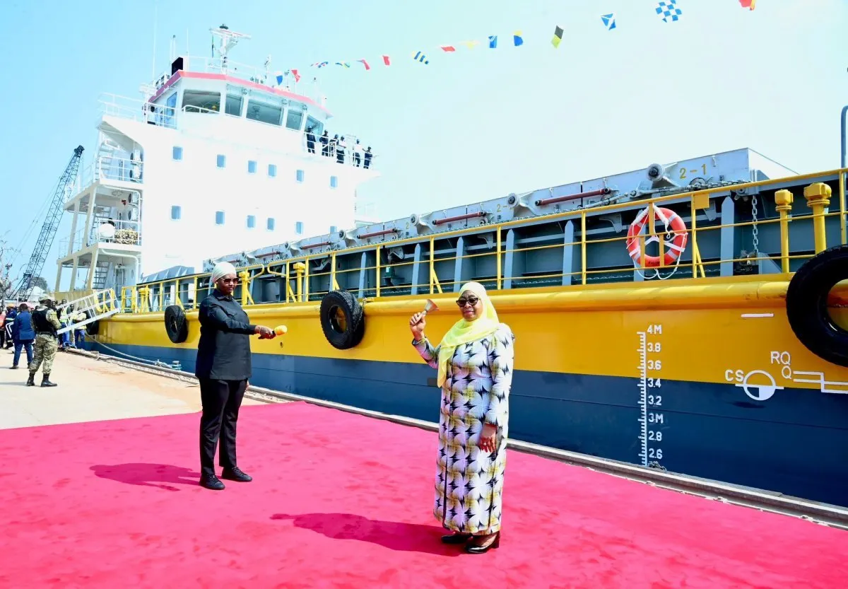 The President of the United Republic of Tanzania, Her Excellency Dr. Samia Suluhu Hassan, striking the ceremonial gong to officially commission four cargo vessels that will operate on Lake Tanganyika, during an event held in Kigoma Region on 20 July 2026.