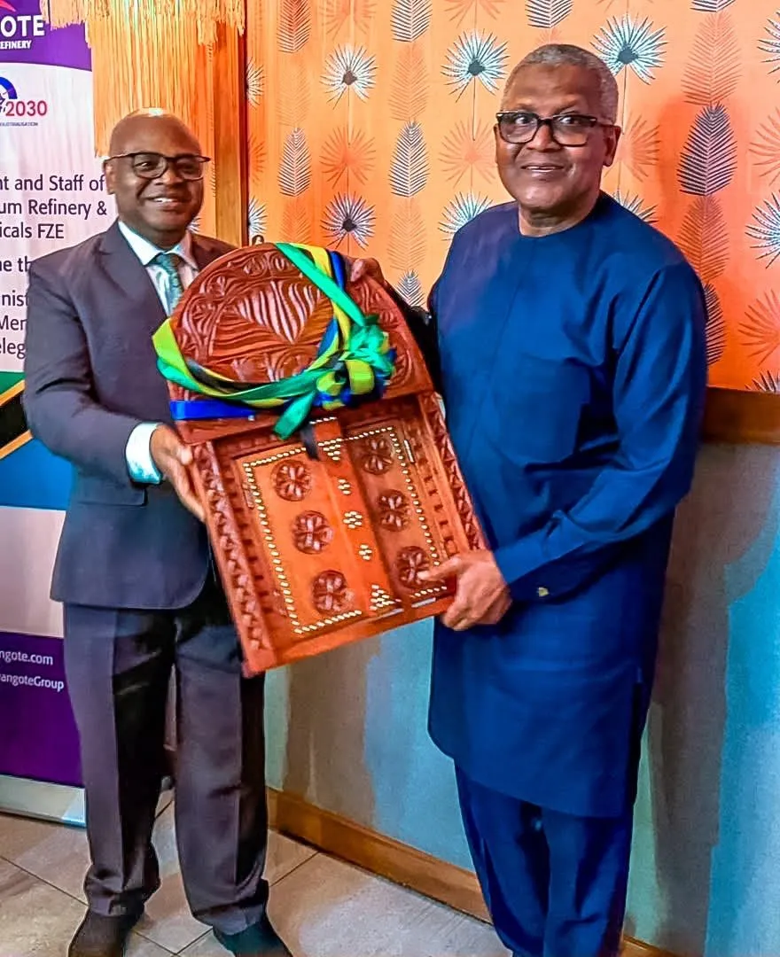 Professor Kitila Mkumbo, Tanzania's Minister of Industry and Trade together with Aliko Dangote